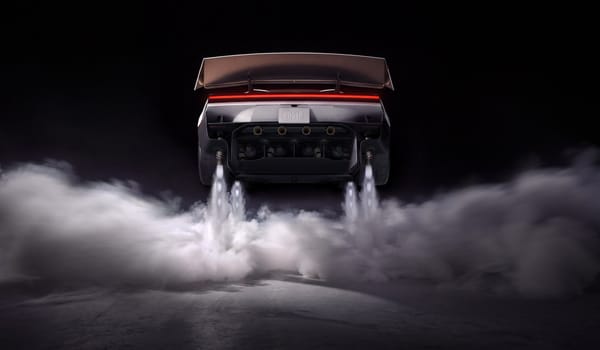 Rear view of the Tesla Roadster with four jets of gas firing downward into a low cloud of vapor